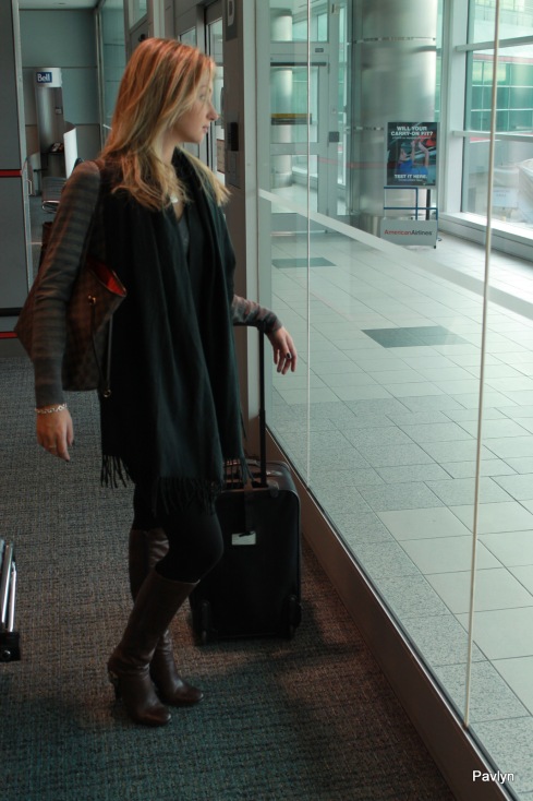 Airport Style is easy with brown boots, tights and oversized cashmere scarf