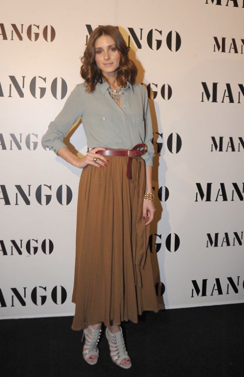 Olivia Palermo wearing brown maxi skirt  and army green top