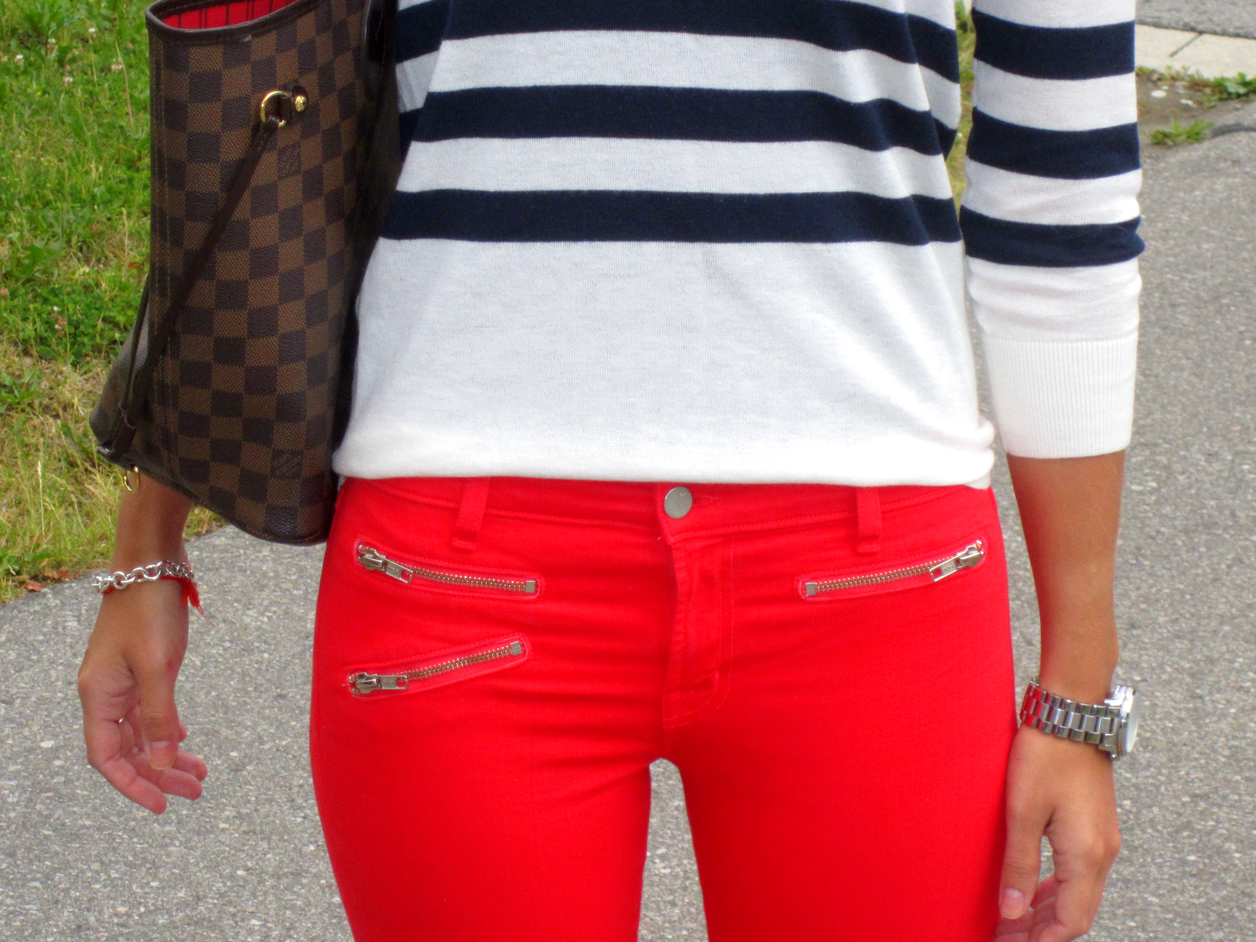 striped sweater and red jeans